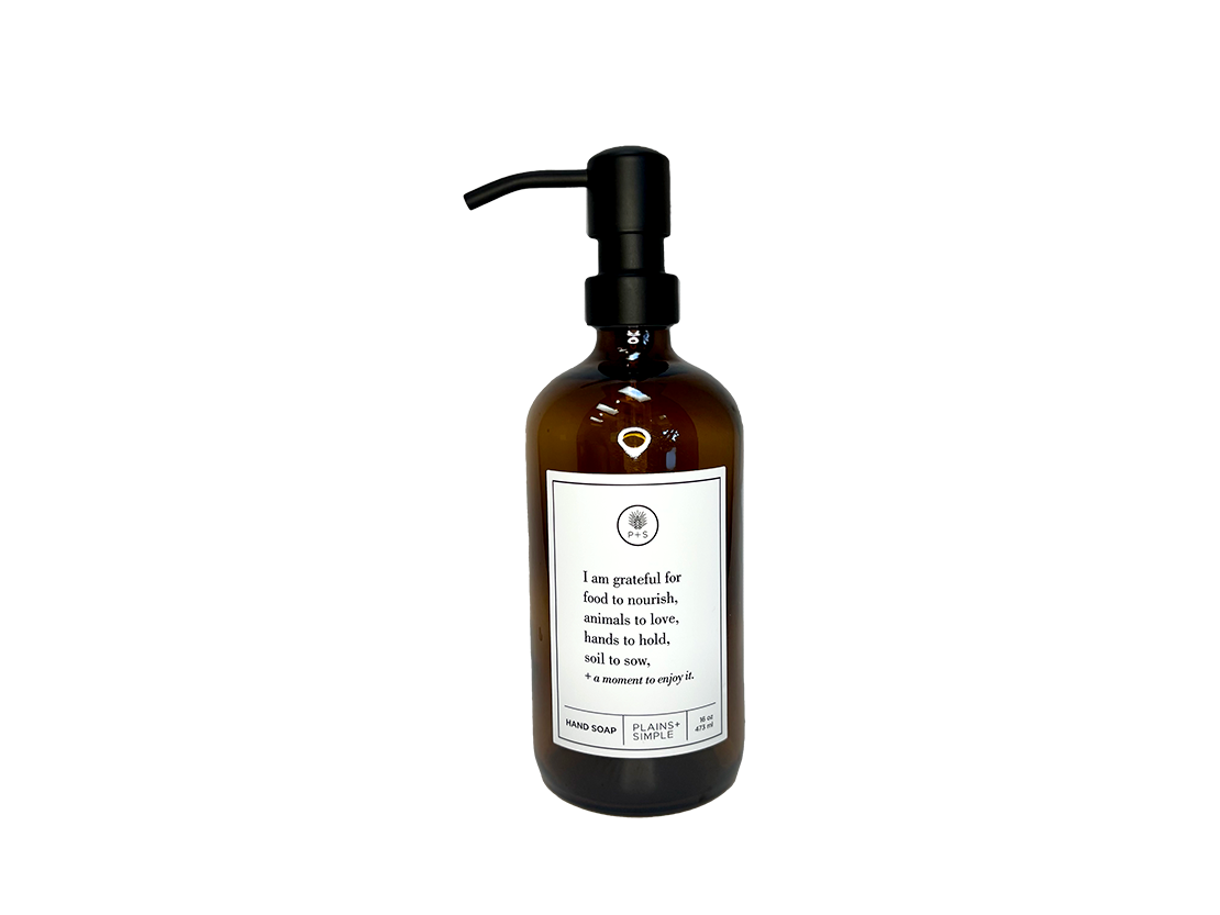 Amber glass I Am Grateful hand soap Gratitude Bottle with black pump.