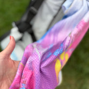 Colorful abstract floral quick-dry towel hanging on a golf bag. Bloom design is based on Isaiah 35:2.