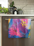 Colorful abstract floral quick-dry towel hanging on the dishwasher handle. Bloom design is based on Isaiah 35:2.