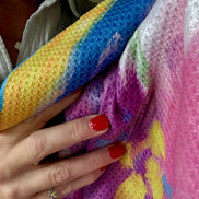 Texture of the colorful abstract floral quick-dry towel up close. Bloom design is based on Isaiah 35:2.