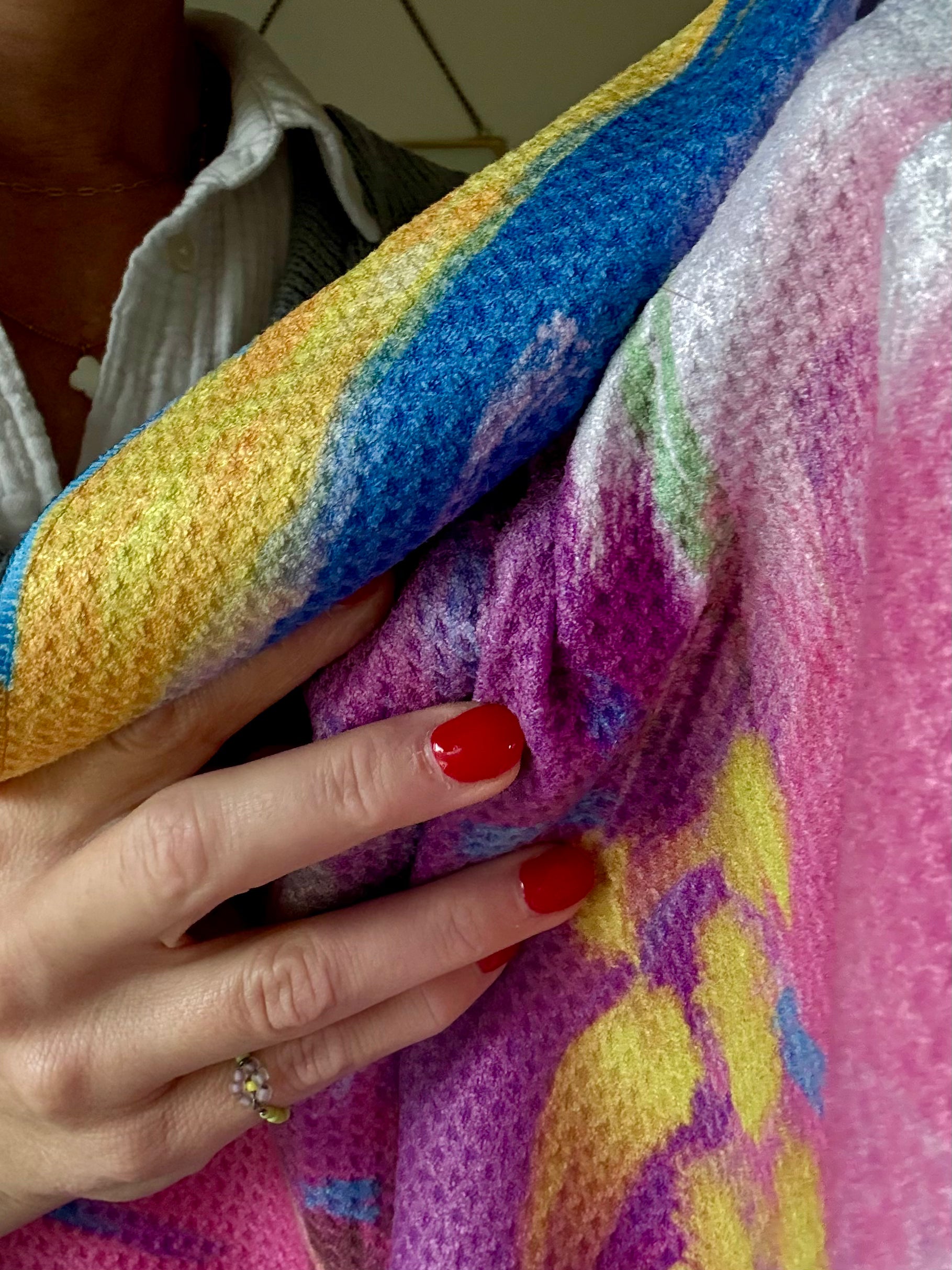Texture of the colorful abstract floral quick-dry towel up close. Bloom design is based on Isaiah 35:2.