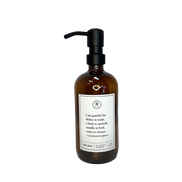 Amber glass I Am Grateful dish soap Gratitude Bottle with black pump.
