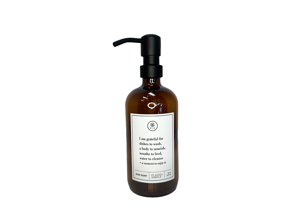 Amber glass I Am Grateful dish soap Gratitude Bottle with black pump.