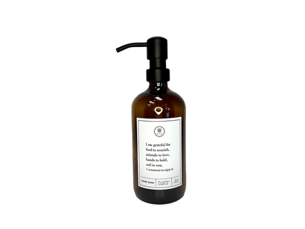 Amber glass I Am Grateful hand soap Gratitude Bottle with black pump.