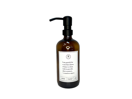 Amber glass I Am Grateful Gratitude Lotion Bottle with black pump.