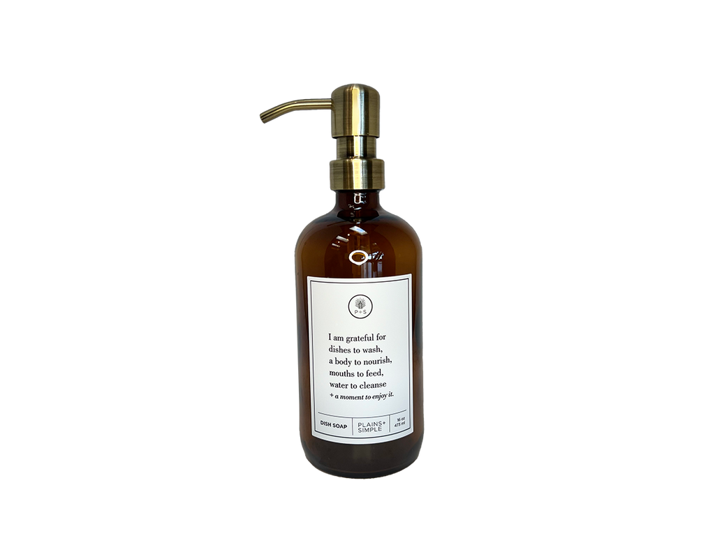 Amber glass I Am Grateful dish soap Gratitude Bottle with gold pump.