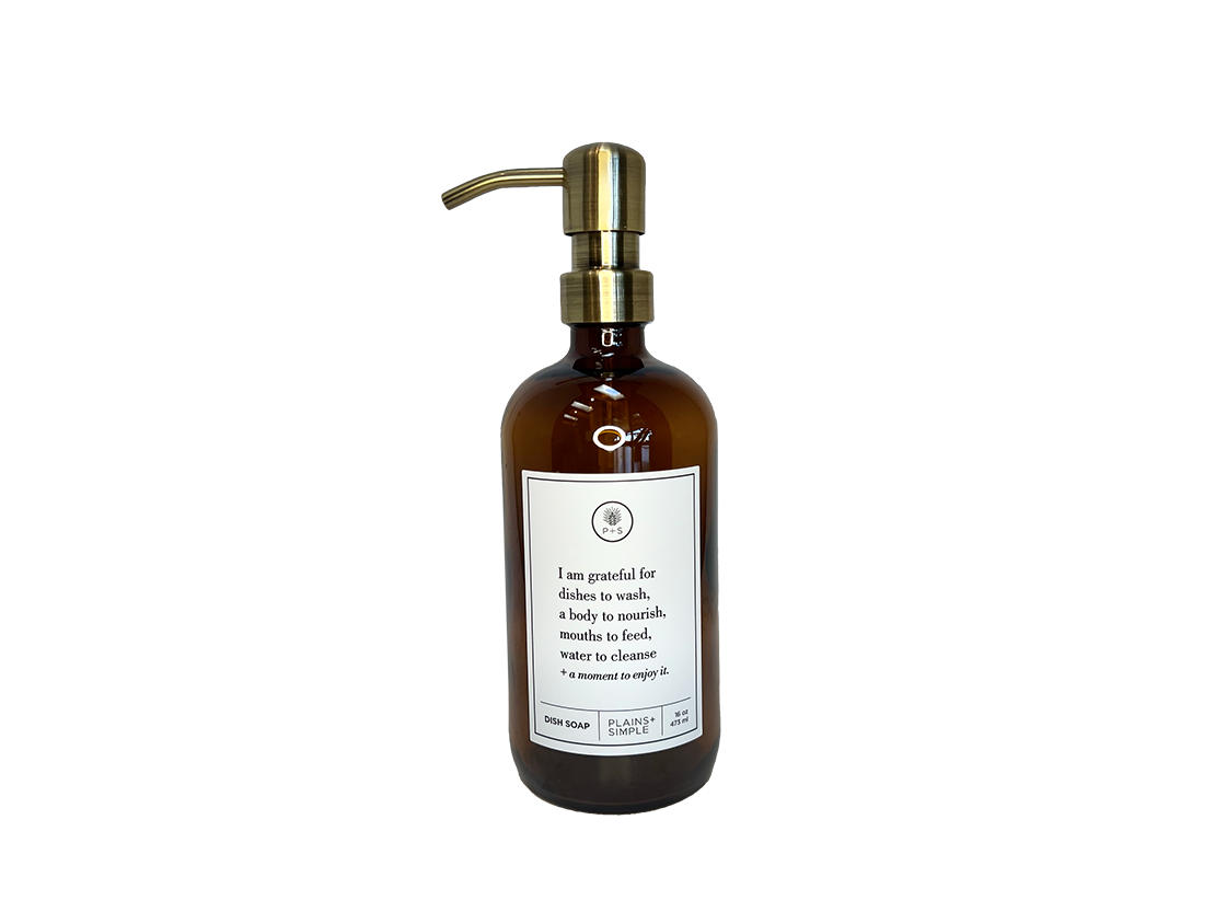 Amber glass I Am Grateful dish soap Gratitude Bottle with gold pump.