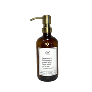 Amber glass I Am Grateful hand soap Gratitude Bottle with gold pump.