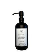 Black glass I Am Grateful dish soap Gratitude Bottle with black pump.