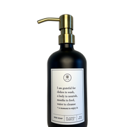 Black glass I Am Grateful dish soap Gratitude Bottle with gold pump.