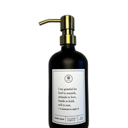 Black glass I Am Grateful hand soap Gratitude Bottle with gold pump.