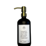 Black glass I Am Grateful Gratitude Lotion Bottle with gold pump.