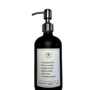 Black glass I Am Grateful hand soap Gratitude Bottle with silver pump.