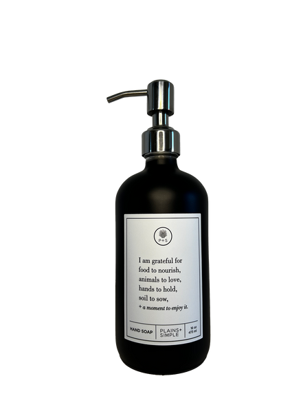 Black glass I Am Grateful hand soap Gratitude Bottle with silver pump.