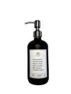 Black glass I Am Grateful Gratitude Lotion Bottle with silver pump.