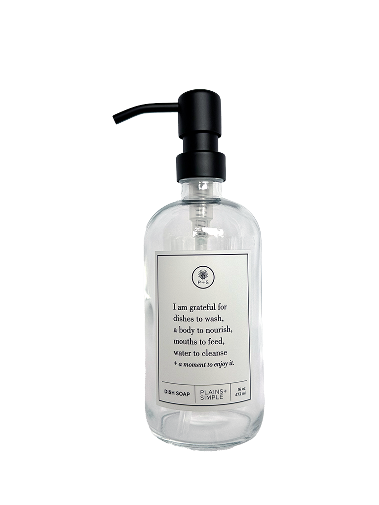 Clear glass I Am Grateful dish soap Gratitude Bottle with black pump.