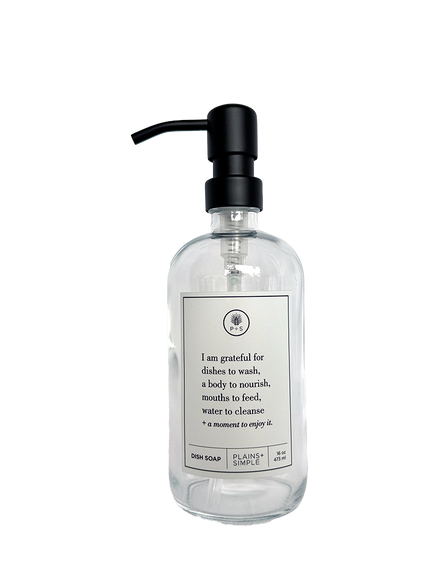 Clear glass I Am Grateful dish soap Gratitude Bottle with black pump.