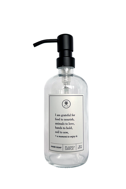 Clear glass I Am Grateful hand soap Gratitude Bottle with black pump.