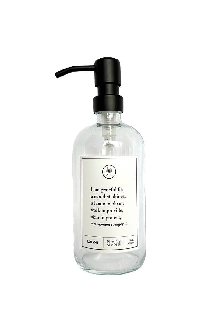 Clear glass I Am Grateful Lotion Gratitude Bottle with black pump.