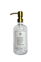 Clear glass I Am Grateful hand soap Gratitude Bottle with gold pump.
