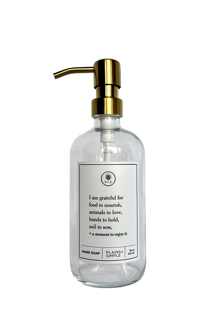 Clear glass I Am Grateful hand soap Gratitude Bottle with gold pump.