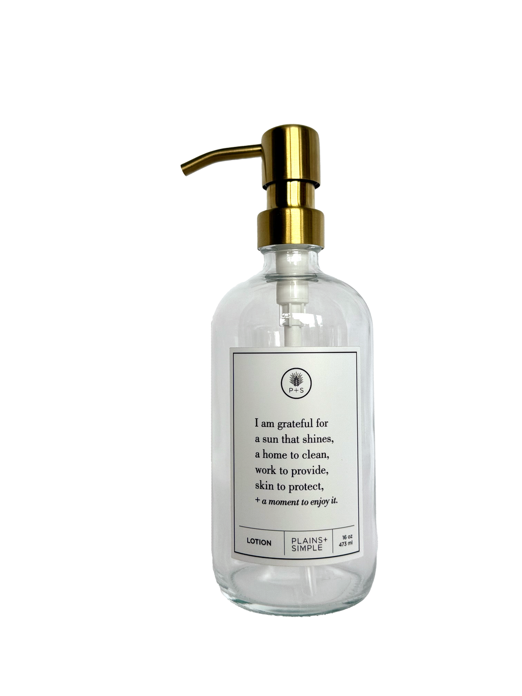Clear glass I Am Grateful Lotion Gratitude Bottle with gold pump.