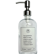 Clear glass I Am Grateful dish soap Gratitude Bottle with silver pump.