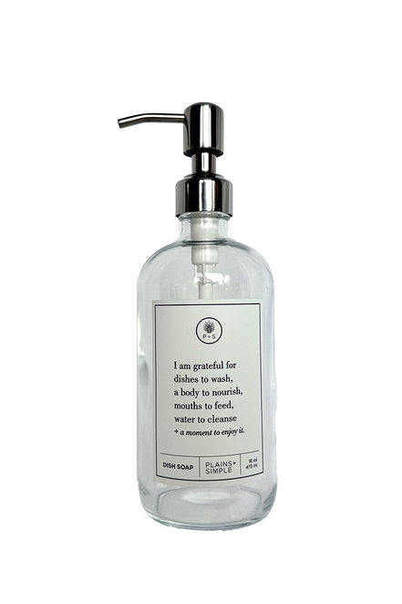 Clear glass I Am Grateful dish soap Gratitude Bottle with silver pump.