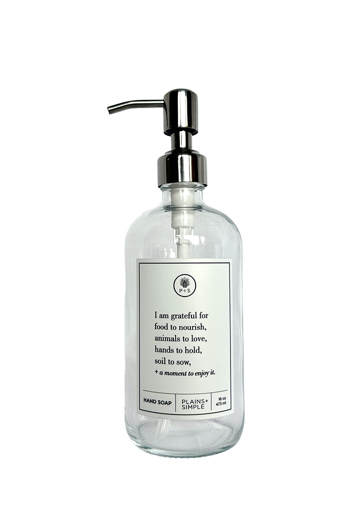 Clear glass I Am Grateful hand soap Gratitude Bottle with silver pump.