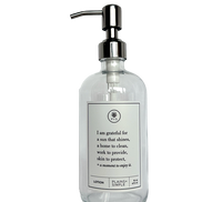 Clear glass I Am Grateful Lotion Gratitude Bottle with silver pump.