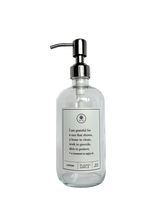 Clear glass I Am Grateful Lotion Gratitude Bottle with silver pump.
