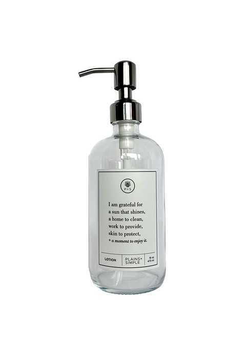 Clear glass I Am Grateful Lotion Gratitude Bottle with silver pump.