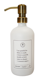 White glass I Am Grateful dish soap Gratitude Bottle with gold pump.