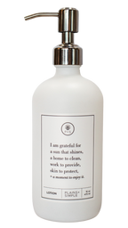 White glass I Am Grateful Lotion Gratitude Bottle with silver pump.