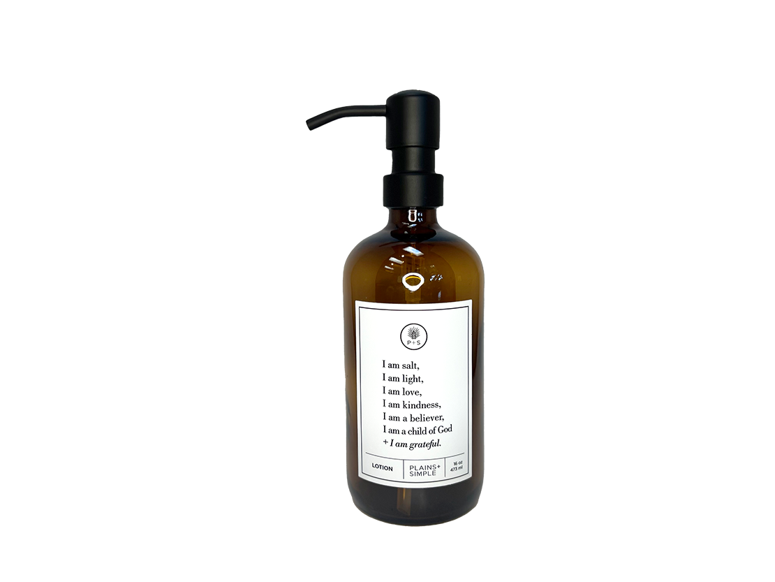 Amber glass I am Salt & Light lotion Gratitude Bottle with black pump.