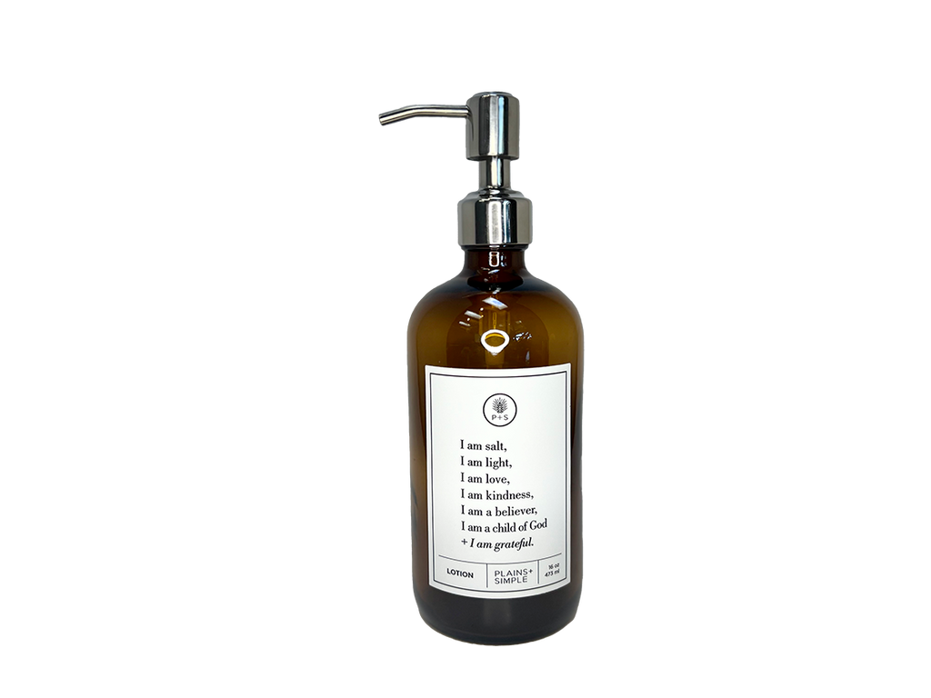 Amber glass I am Salt & Light lotion Gratitude Bottle with silver pump.