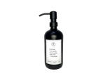Black glass I am Kind hand soap Gratitude Bottle with black pump.