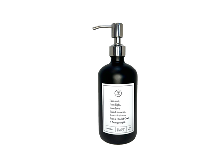 Black glass I am Salt & Light lotion Gratitude Bottle with silver pump.