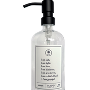 Clear glass I am Salt & Light lotion Gratitude Bottle with black pump.