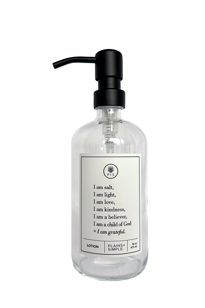 Clear glass I am Salt & Light lotion Gratitude Bottle with black pump.