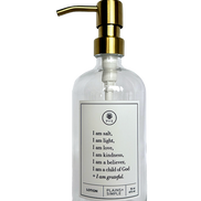 Clear glass I am Salt & Light lotion Gratitude Bottle with gold pump.