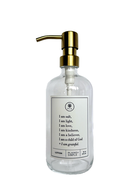 Clear glass I am Salt & Light lotion Gratitude Bottle with gold pump.
