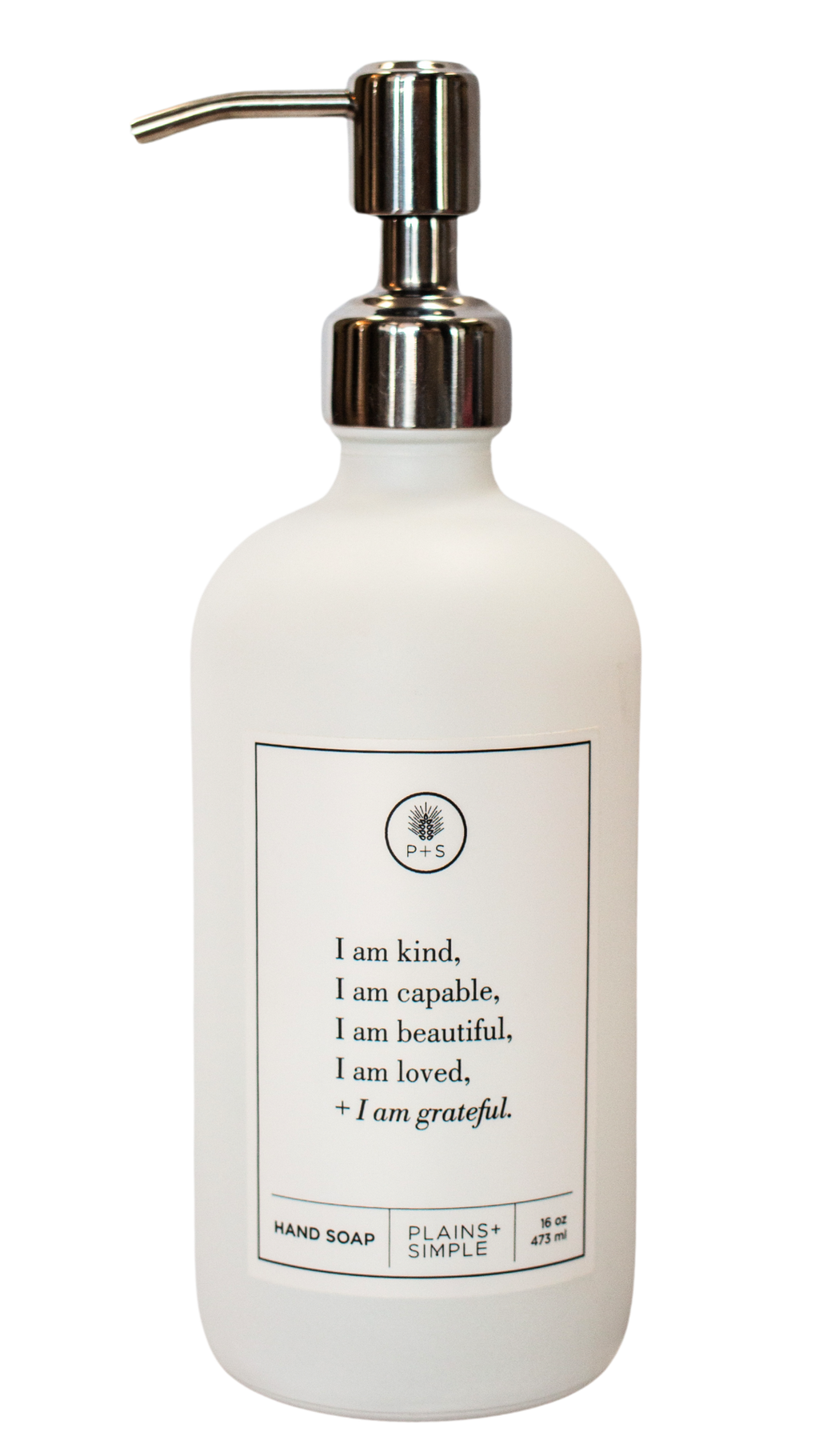 White glass I am Kind hand soap Gratitude Bottle with silver pump.