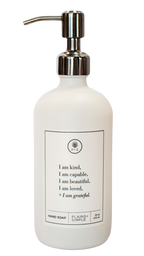 White glass I am Kind hand soap Gratitude Bottle with silver pump.