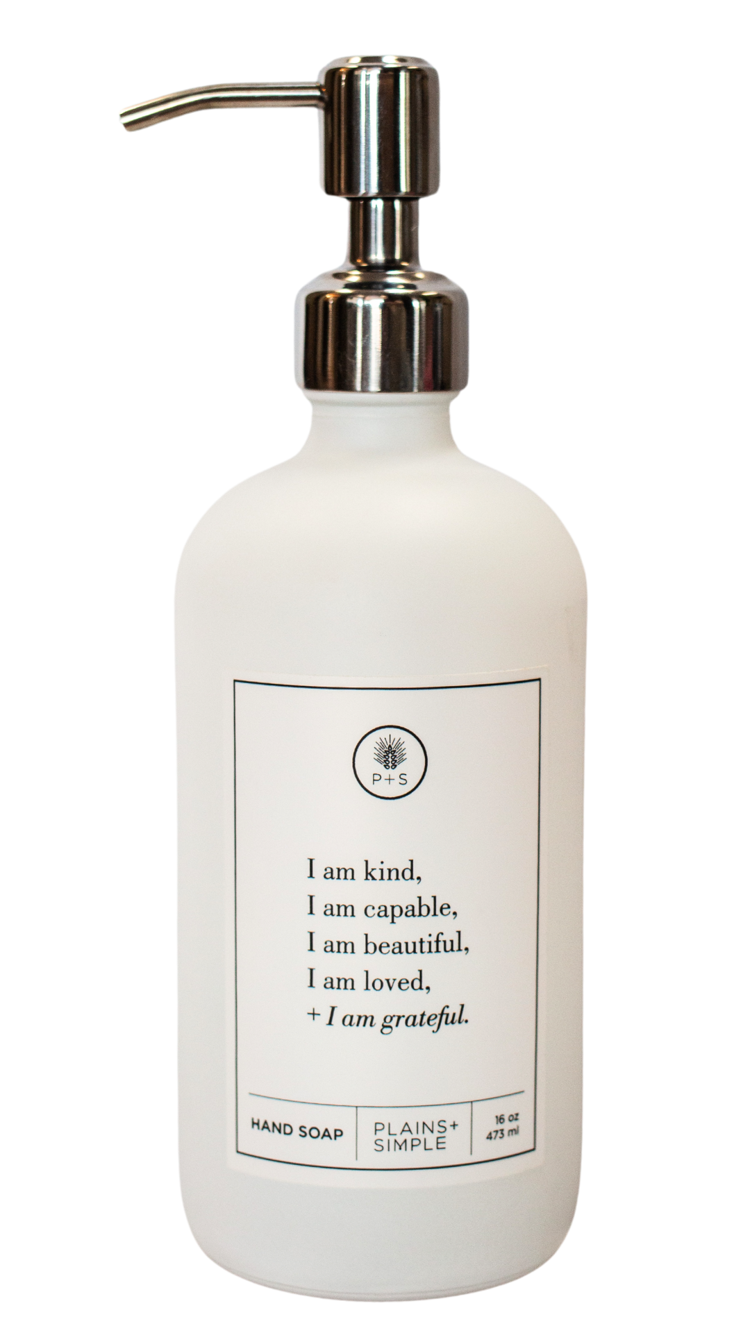 White glass I am Kind hand soap Gratitude Bottle with silver pump.