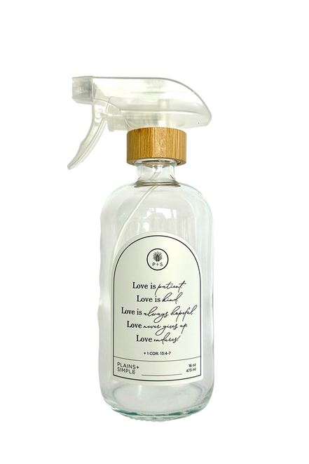 Clear glass Love Is... multipurpose Gratitude Bottle with spray pump.