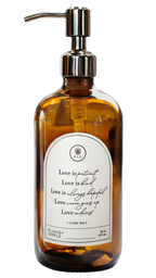 Amber glass Love Is... multipurpose Gratitude Bottle with silver pump.