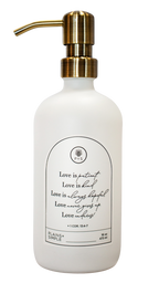 White glass Love Is... multipurpose Gratitude Bottle with gold pump.