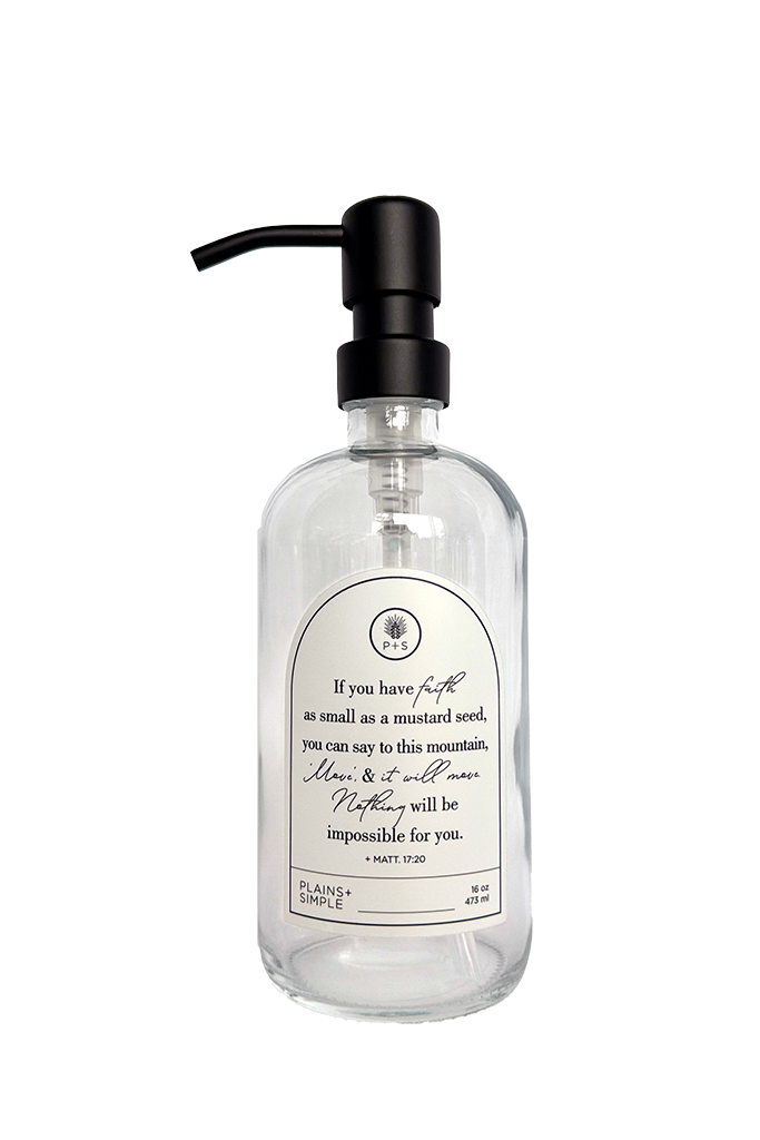 Clear glass Mustard Seed multipurpose Gratitude Bottle with black pump.