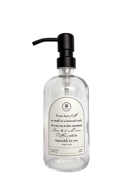 Clear glass Mustard Seed multipurpose Gratitude Bottle with black pump.